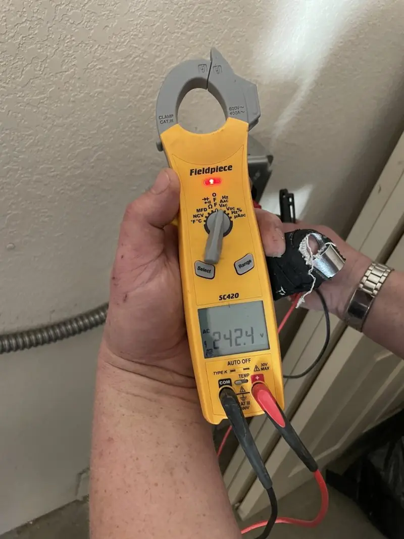Voltage testing with clamp meter during Electrical Installation Services in Orcutt